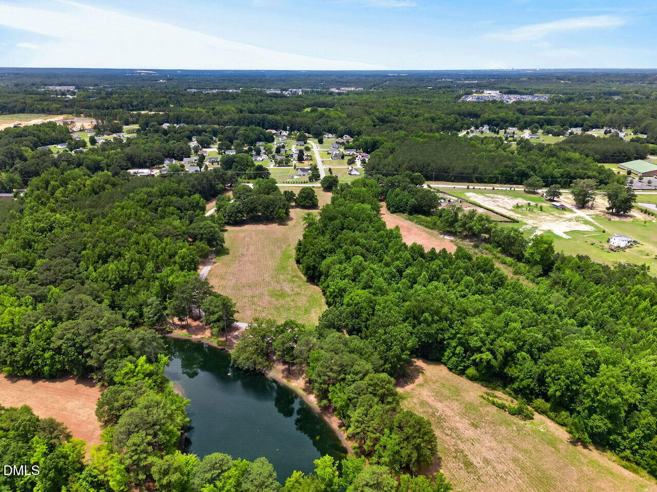 1217 Eagle Rock Road Wendell, NC 27591 - Photo 14 of 17 an aerial view of residential houses with outdoor space and river