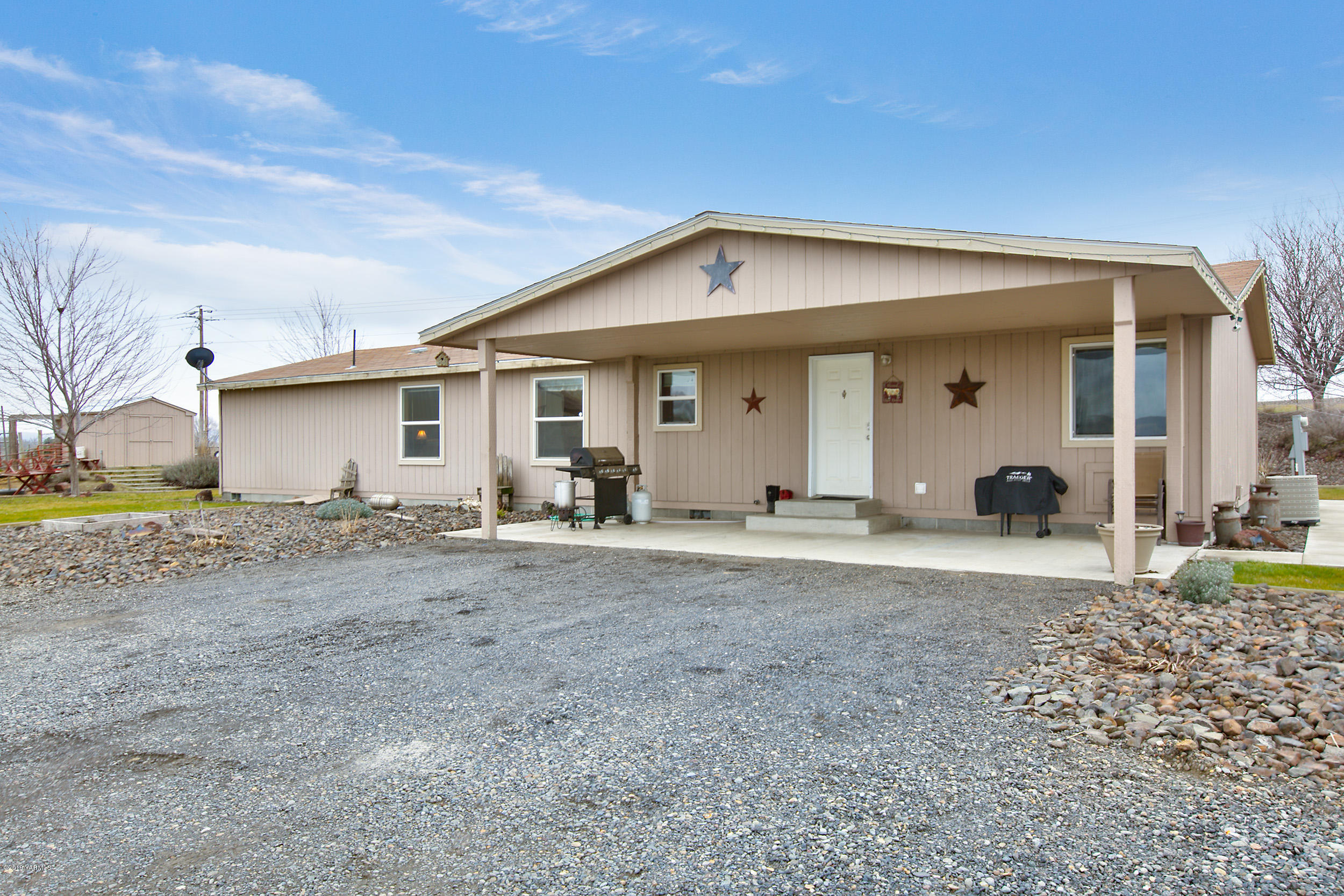 177 Division Road Zillah, WA 98953 - Photo 20 of 23 a view of a house with backyard
