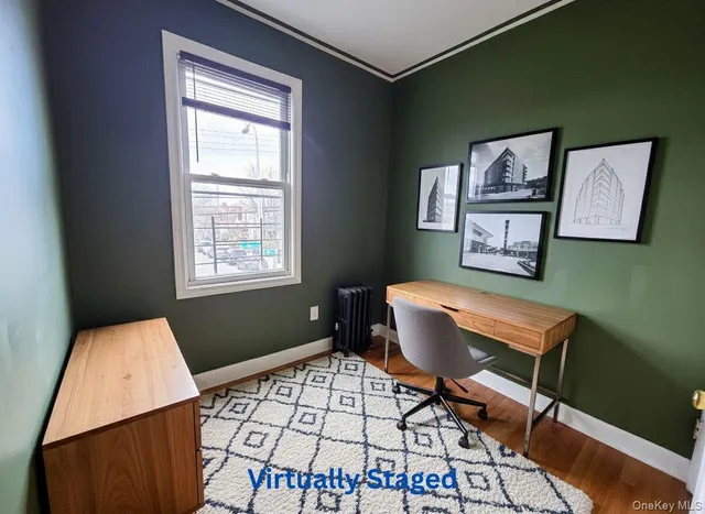 a workspace with furniture and window