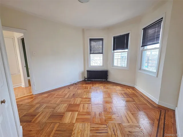 a view of empty room with windows