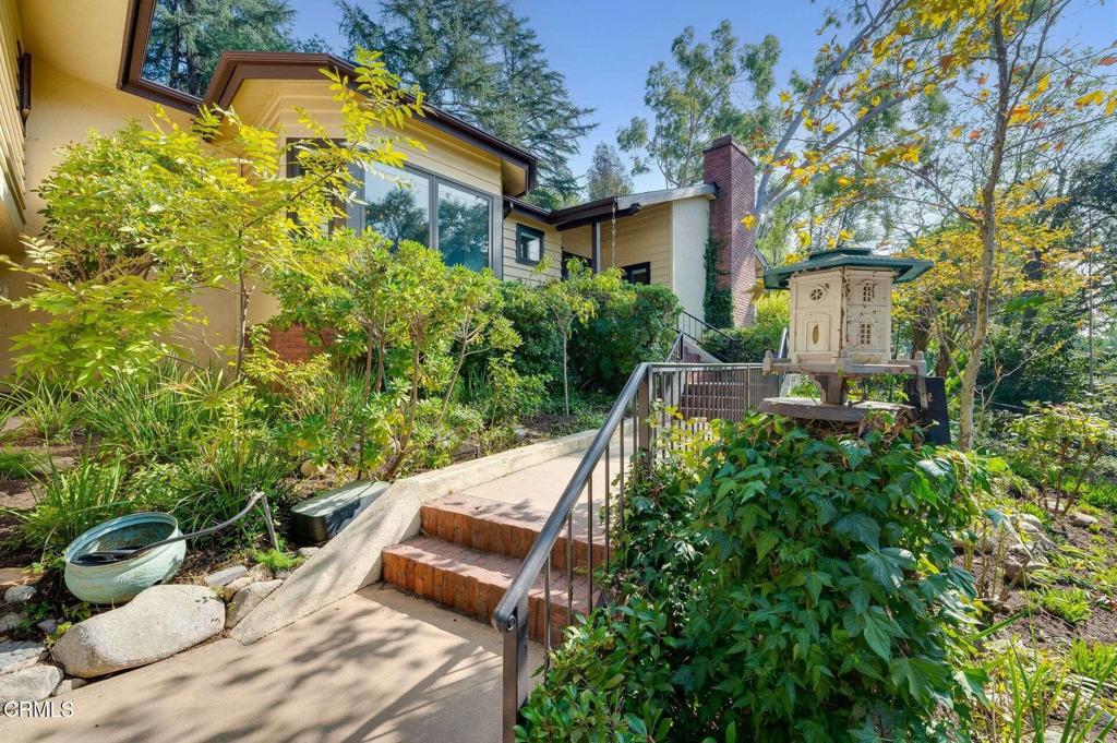 a garden view with a seating space