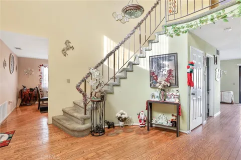a view of entryway livingroom and hall