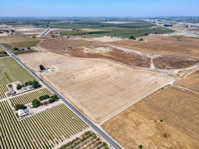 a view of a swimming pool and an outdoor space