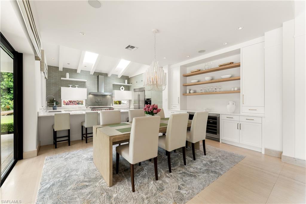 233 Ridge Drive Naples, FL 34108 - Photo 13 of 39 a view of a dining room kitchen and a window