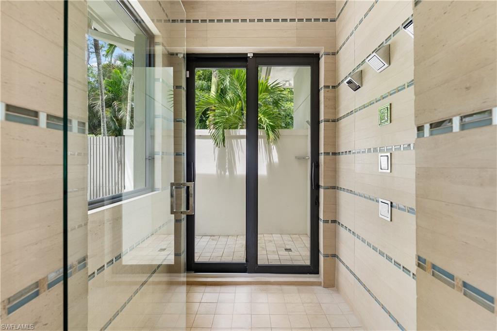 233 Ridge Drive Naples, FL 34108 - Photo 19 of 39 a view of a entrance door of the house