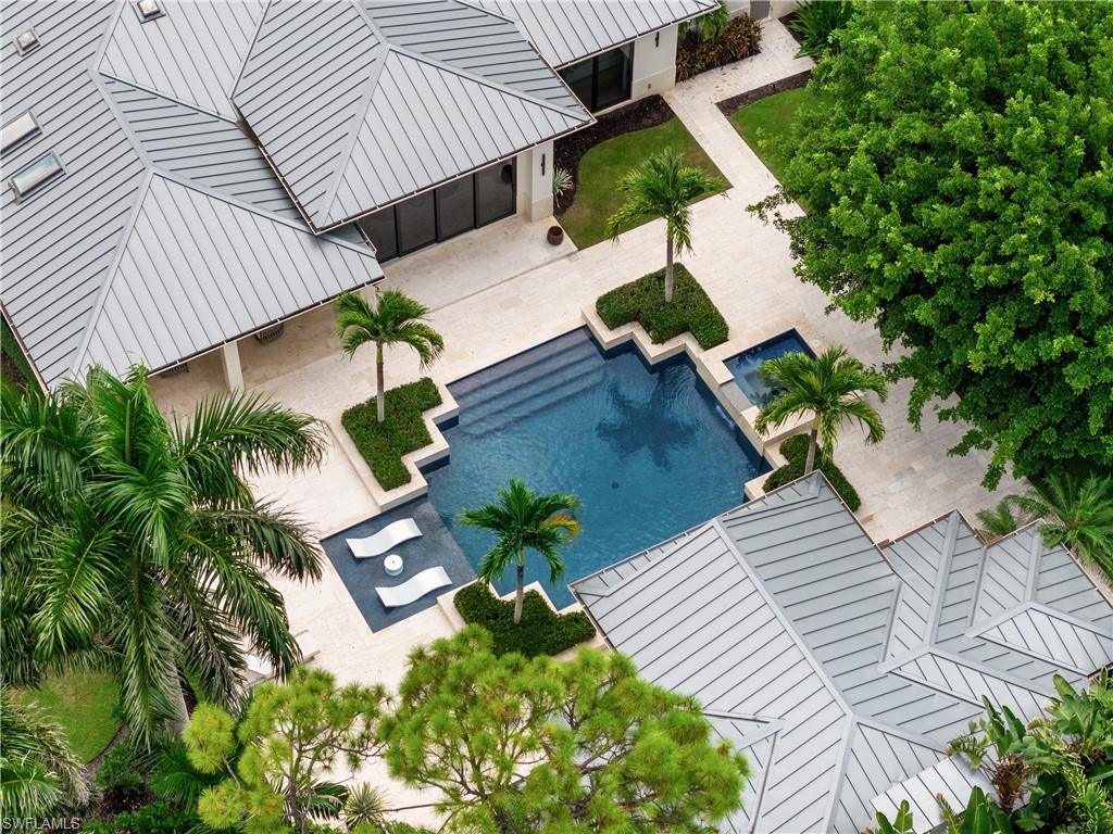 233 Ridge Drive Naples, FL 34108 - Photo 33 of 39 an aerial view of a house with garden space and street view