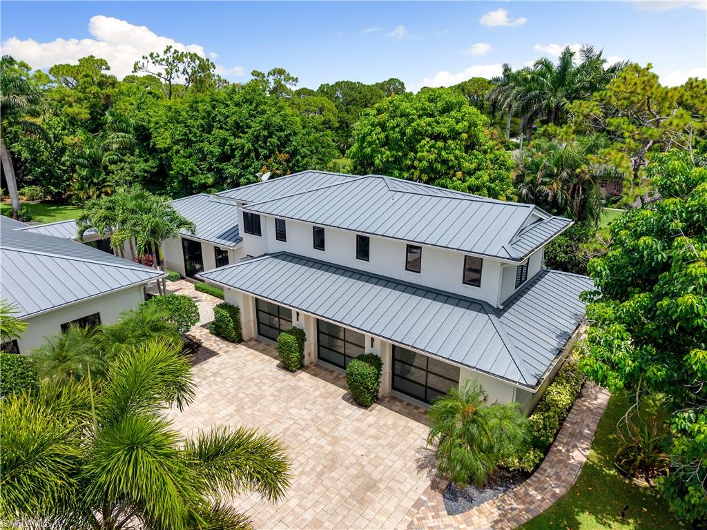 233 Ridge Drive Naples, FL 34108 - Photo 36 of 39 an aerial view of a house