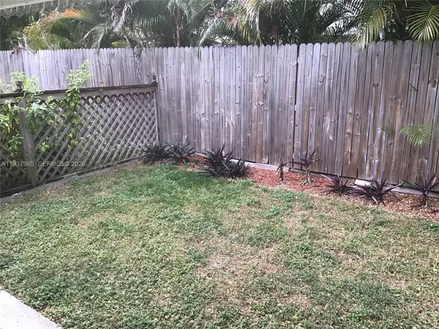 a view of wooden fence