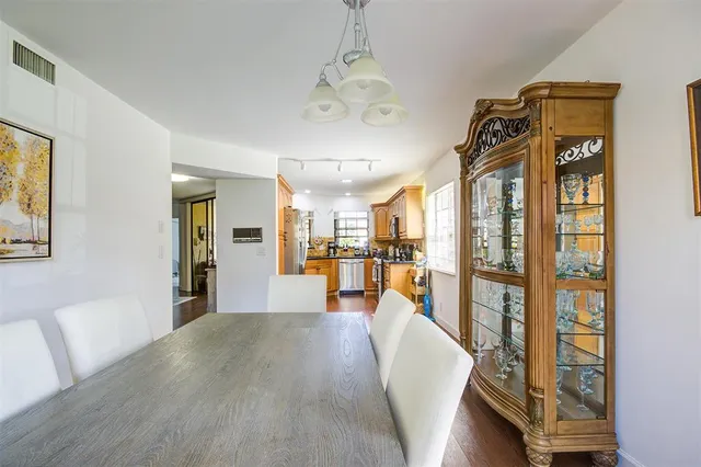 a view of a living room and dining room