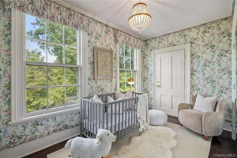 a view of a livingroom with furniture and windows