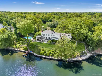 a view of a lake in middle of the house