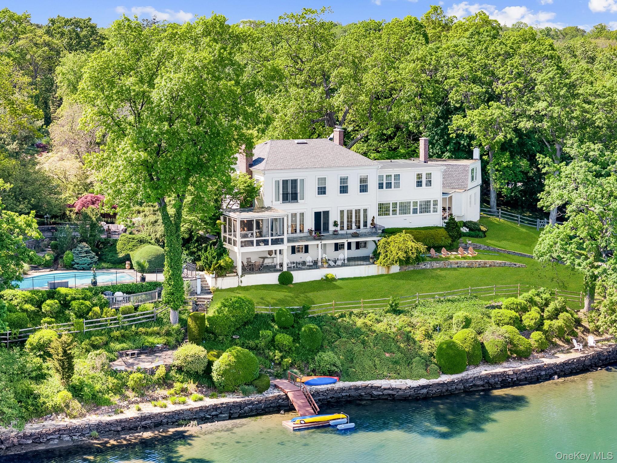 13 Kirby Lane Rye, NY 10580 - Photo 27 of 34 a view of a house with a yard and sitting area