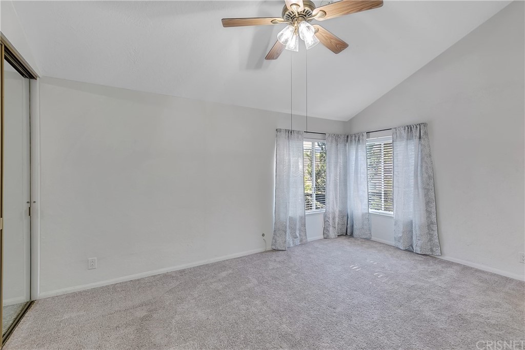 23646 Vía Corsa Valencia, CA 91355 - Photo 26 of 55 a view of an empty room with a window