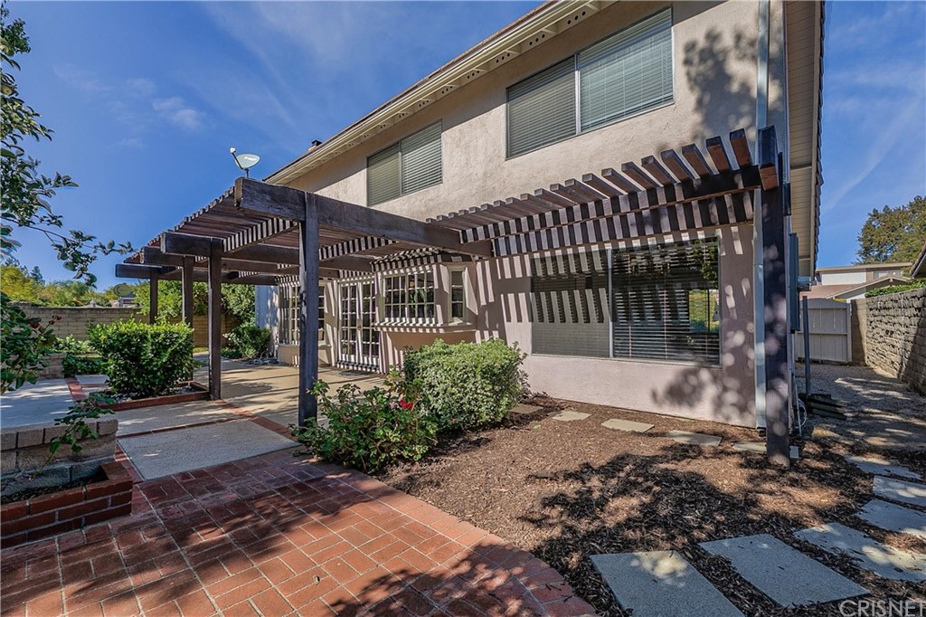 23646 Vía Corsa Valencia, CA 91355 - Photo 41 of 55 a front view of a house with a yard