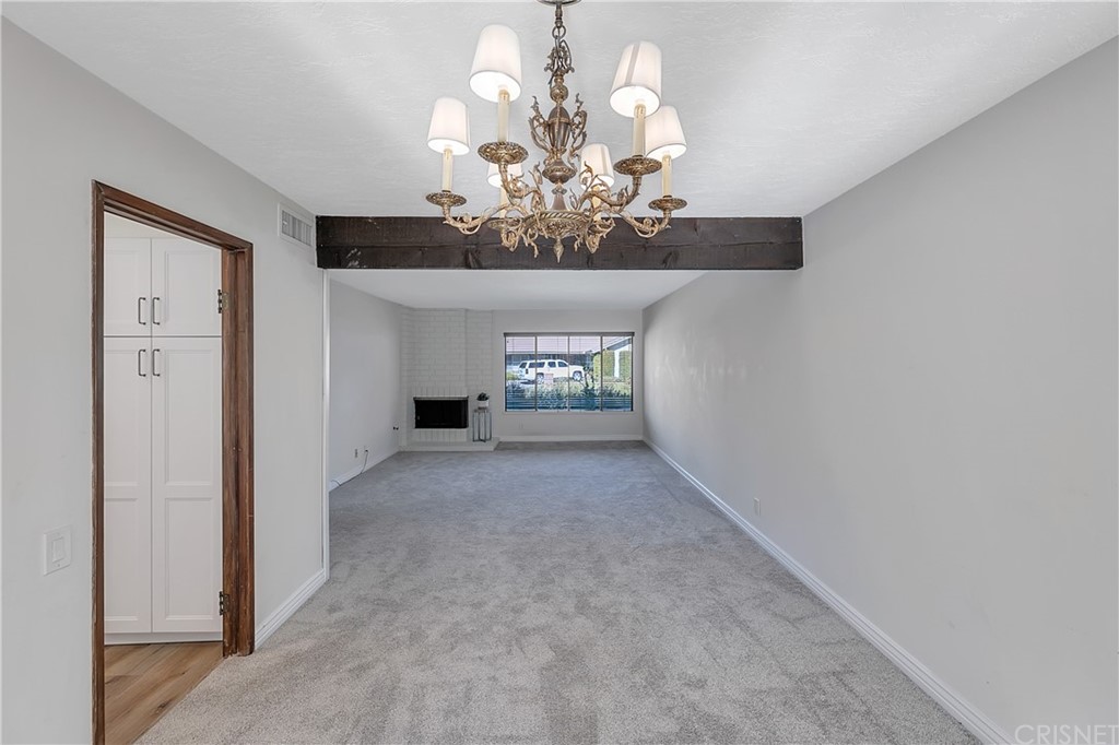 23646 Vía Corsa Valencia, CA 91355 - Photo 10 of 55 a view of a chandelier in big room and chandelier