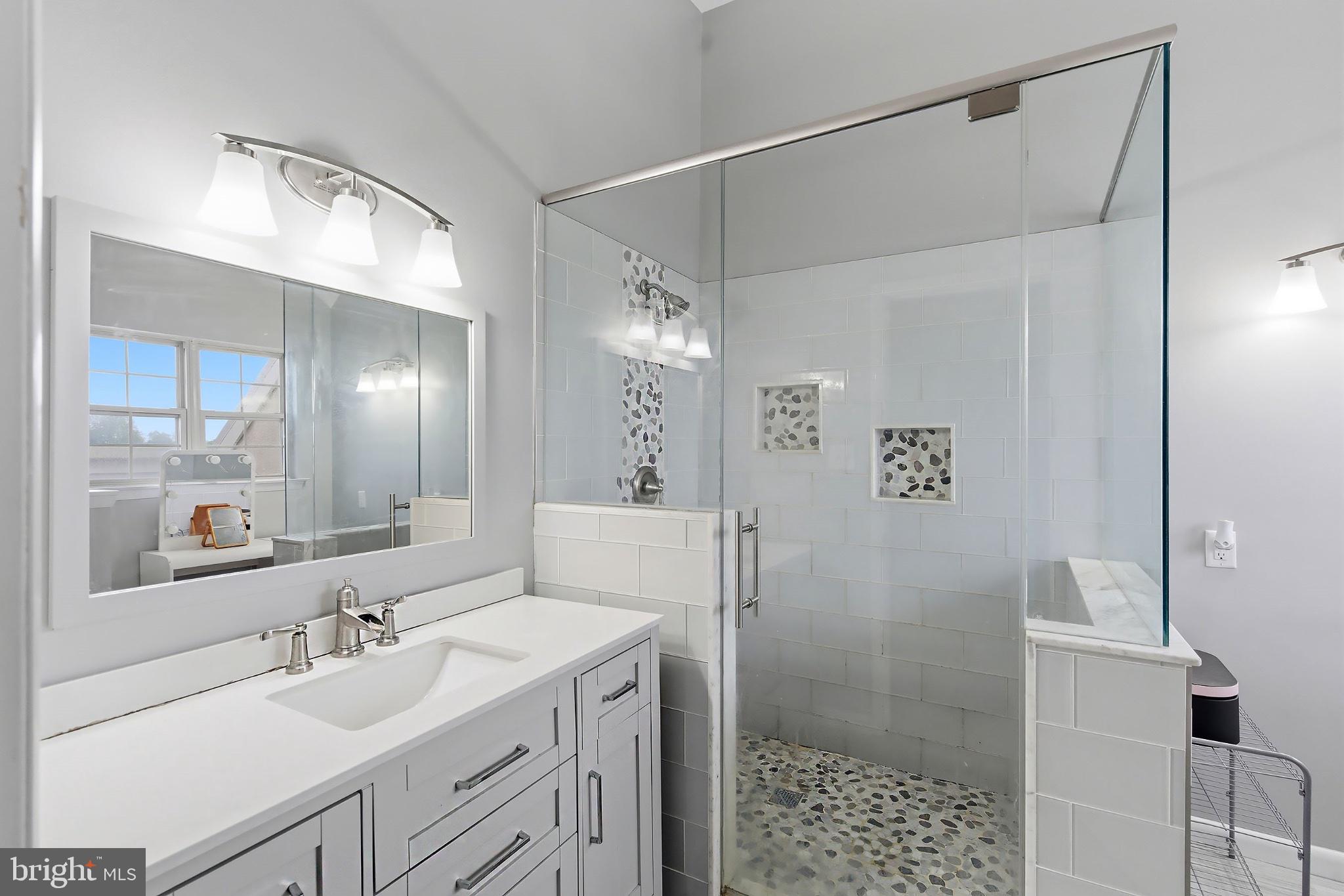 3036 Main Street, Unit 3036 Voorhees, NJ 08043 - Photo 12 of 24 Sleek modern bathroom oasis.