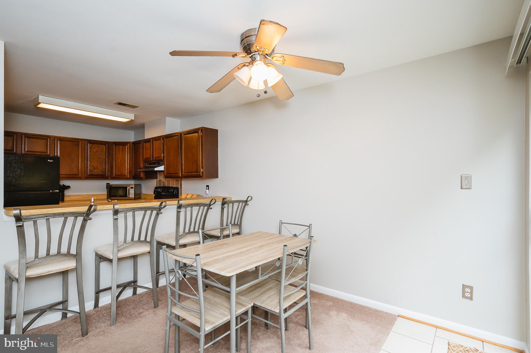 1322 Rigbie Hall Court, Unit F Belcamp, MD 21017 - Photo 12 of 38 Dining Area-Breakfast Bar to Kitchen