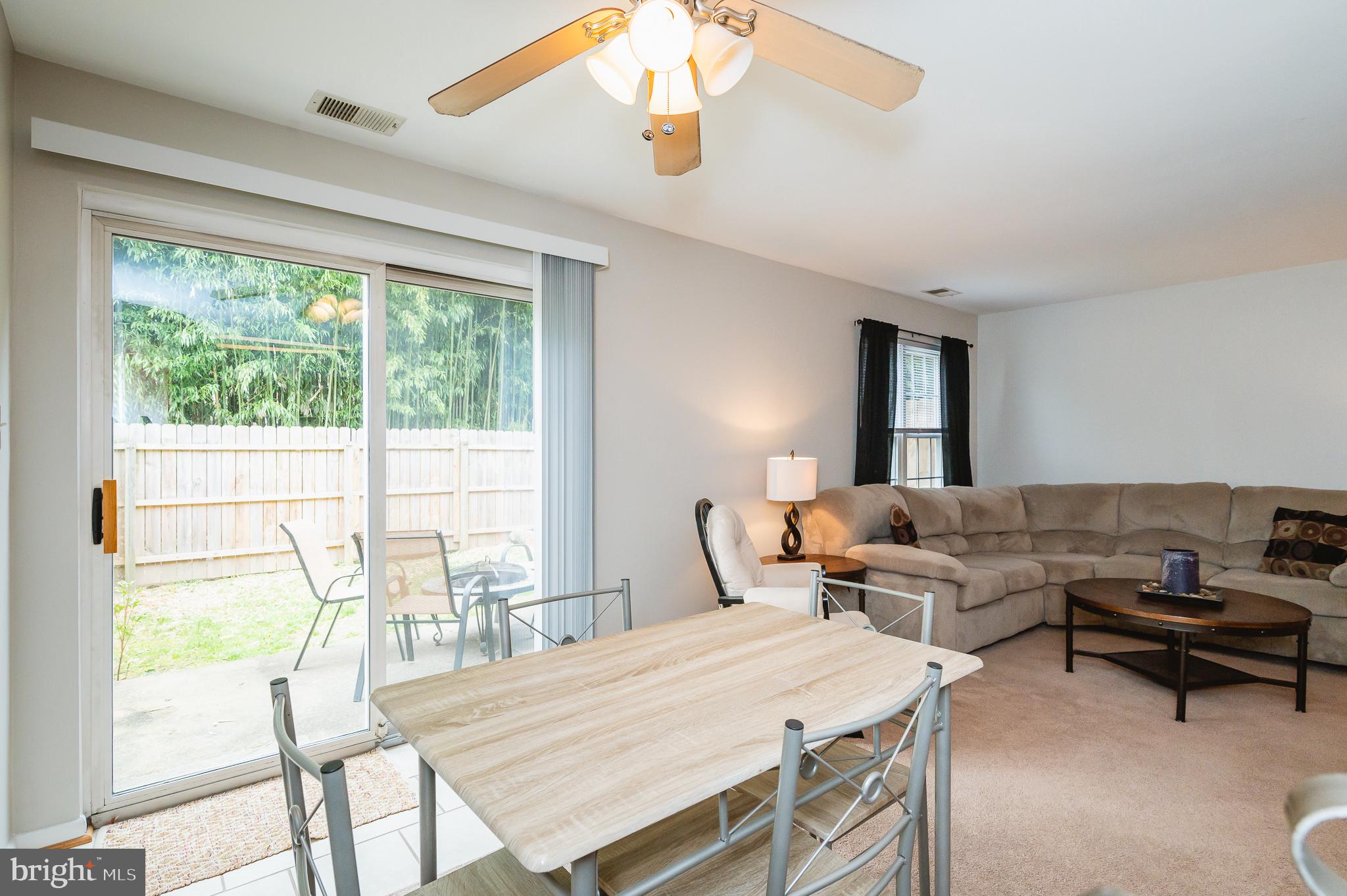 1322 Rigbie Hall Court, Unit F Belcamp, MD 21017 - Photo 14 of 38 Dining Room with Sliders to Patio