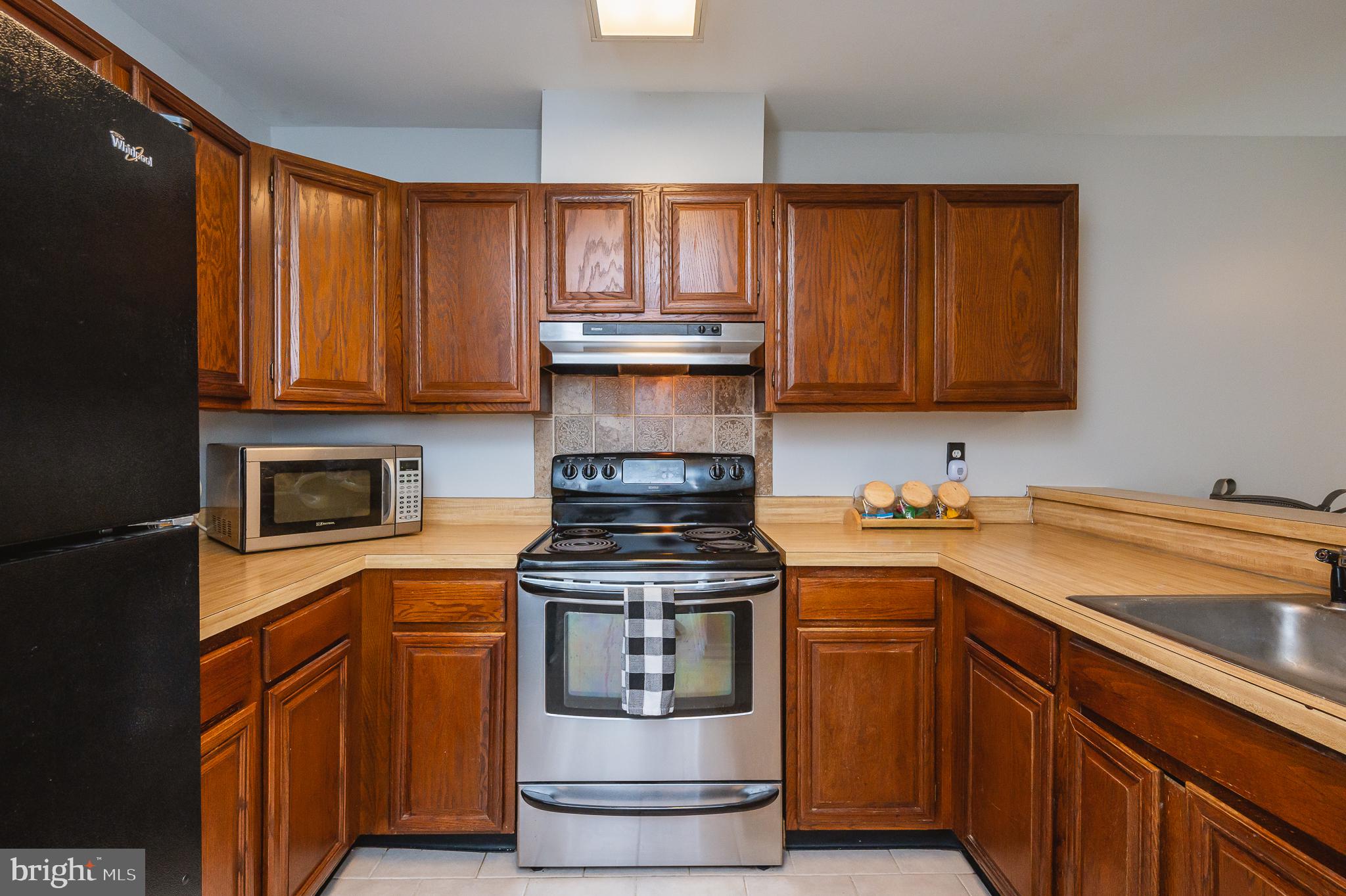 1322 Rigbie Hall Court, Unit F Belcamp, MD 21017 - Photo 16 of 38 Kitchen with Plenty of Counter