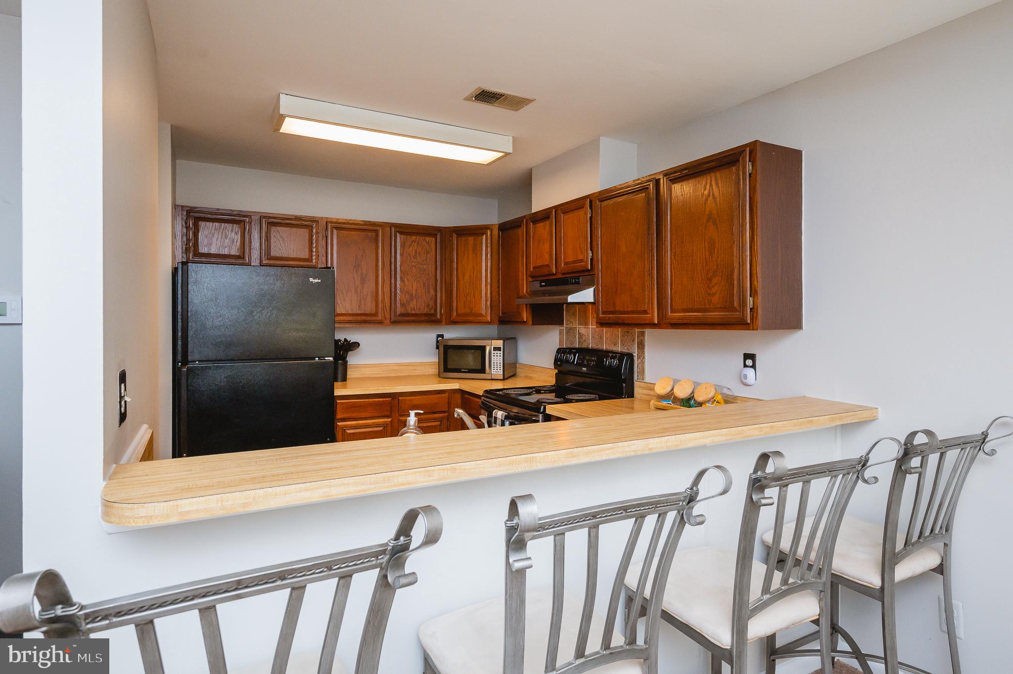 1322 Rigbie Hall Court, Unit F Belcamp, MD 21017 - Photo 22 of 38 Breakfast Bar