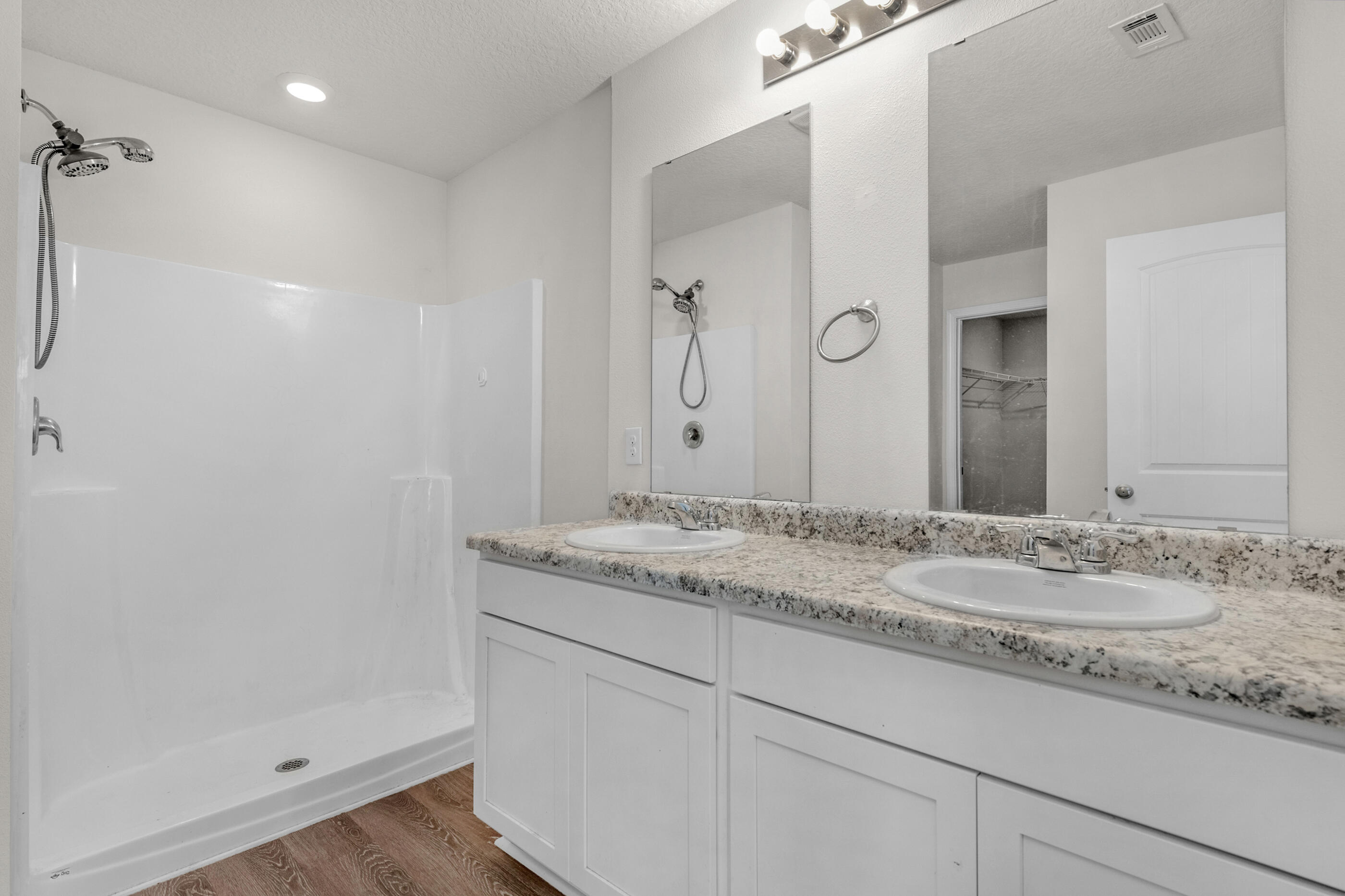 3524 Sugar Maple Lane Crestview, FL 32539 - Photo 14 of 24 a bathroom with a granite countertop sink and a mirror