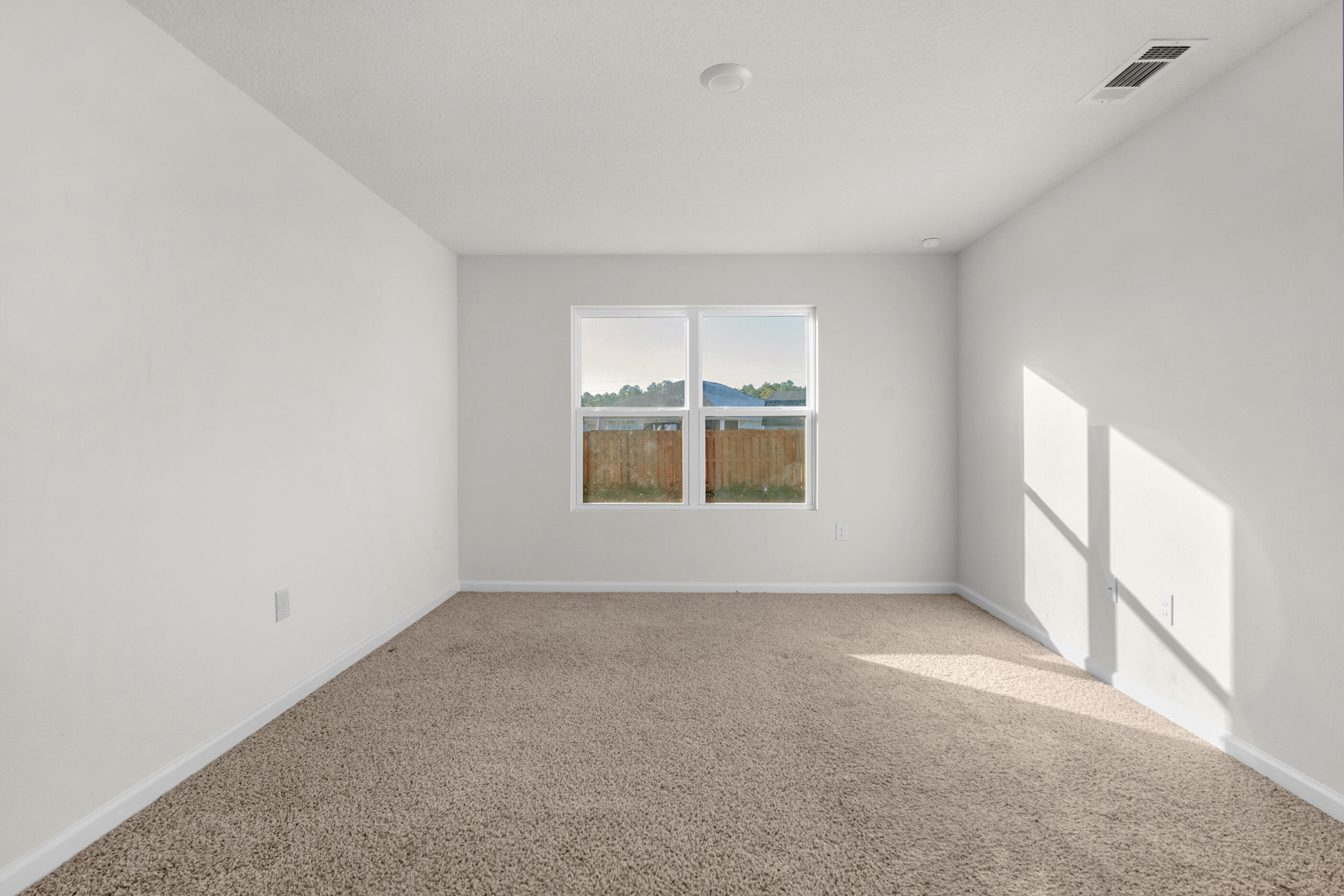 3524 Sugar Maple Lane Crestview, FL 32539 - Photo 16 of 24 a view of an empty room with a window