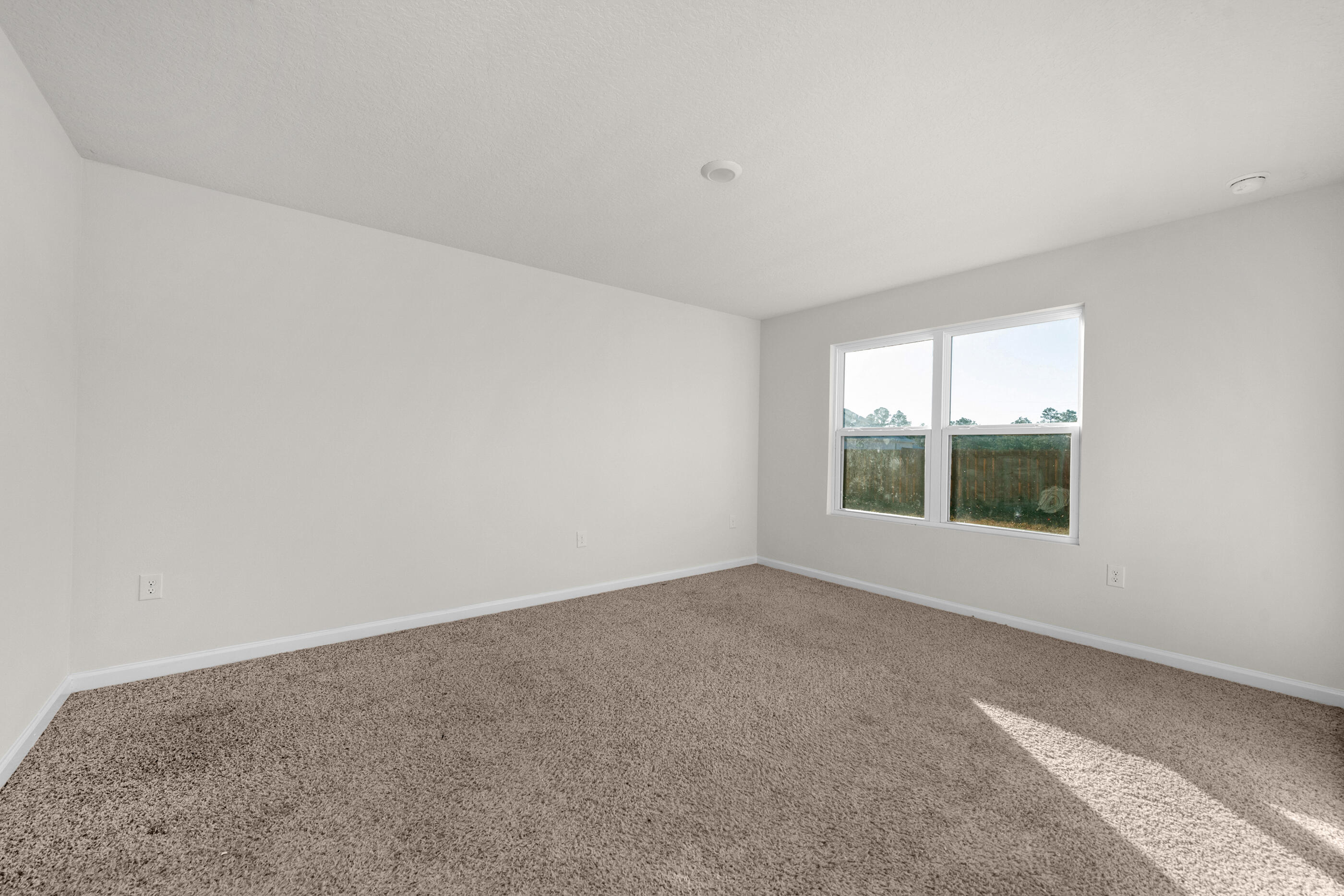 3524 Sugar Maple Lane Crestview, FL 32539 - Photo 21 of 24 a view of an empty room with a window