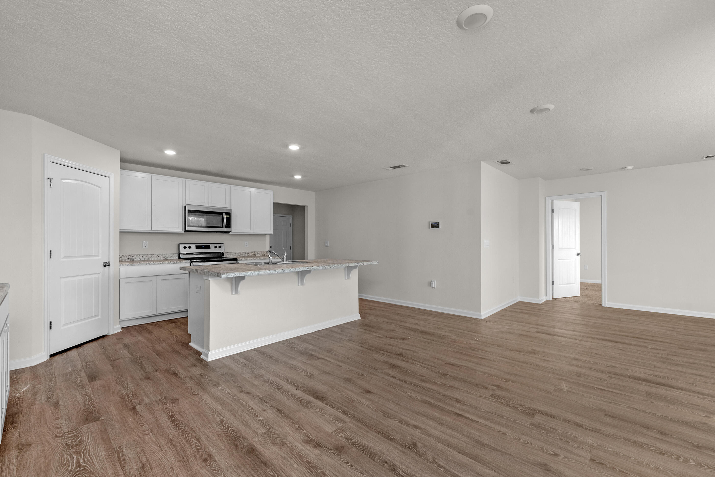 3524 Sugar Maple Lane Crestview, FL 32539 - Photo 5 of 24 a view of kitchen with granite countertop cabinets and white appliances
