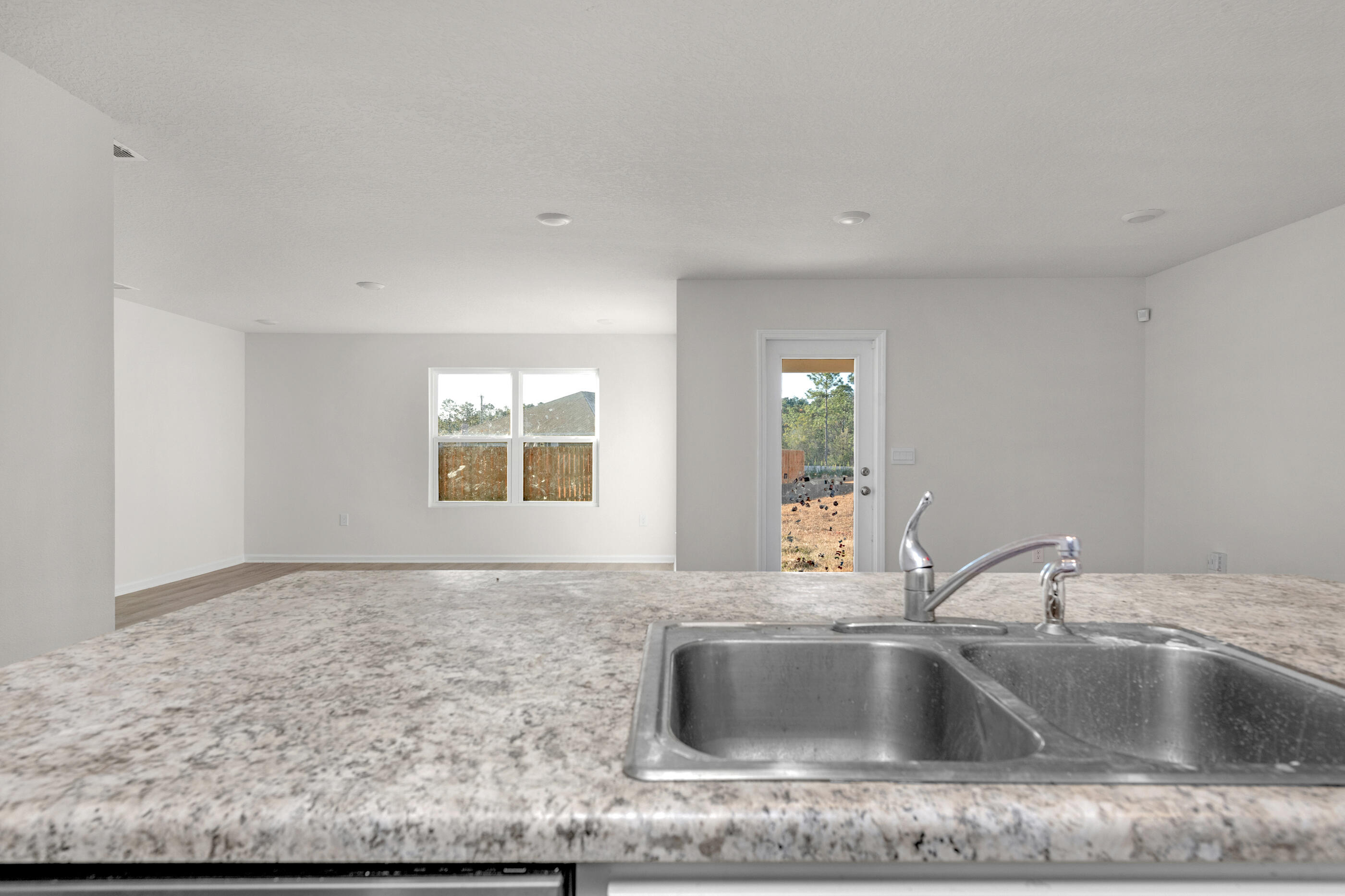 3524 Sugar Maple Lane Crestview, FL 32539 - Photo 8 of 24 a kitchen with sink and window