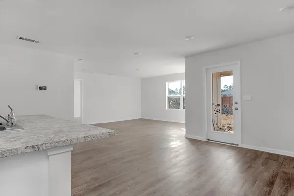 a view of an empty room and window