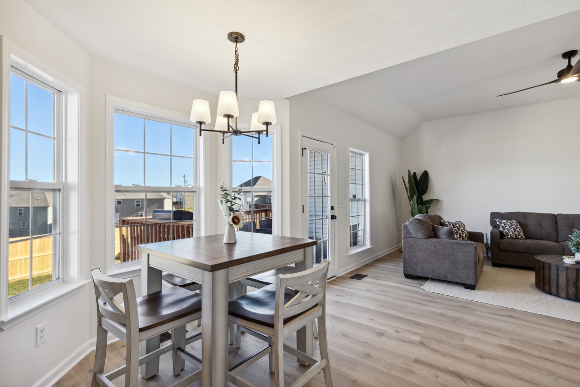 486 Berry Circle Springfield, TN 37172 - Photo 11 of 27 a dining room with furniture and window