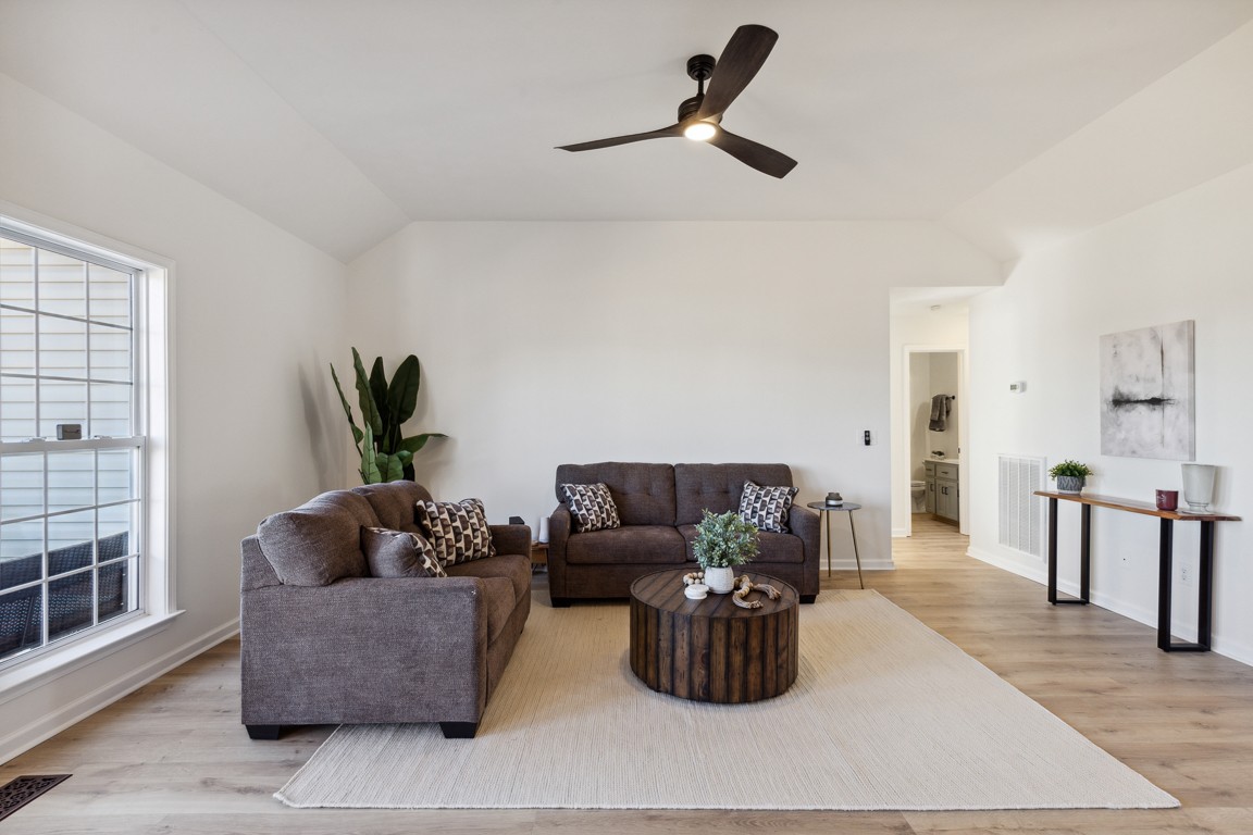 486 Berry Circle Springfield, TN 37172 - Photo 12 of 27 a living room with furniture and a wooden floor