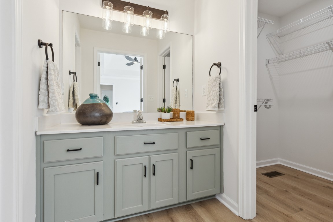 486 Berry Circle Springfield, TN 37172 - Photo 17 of 27 a bathroom with a double vanity sink and mirror