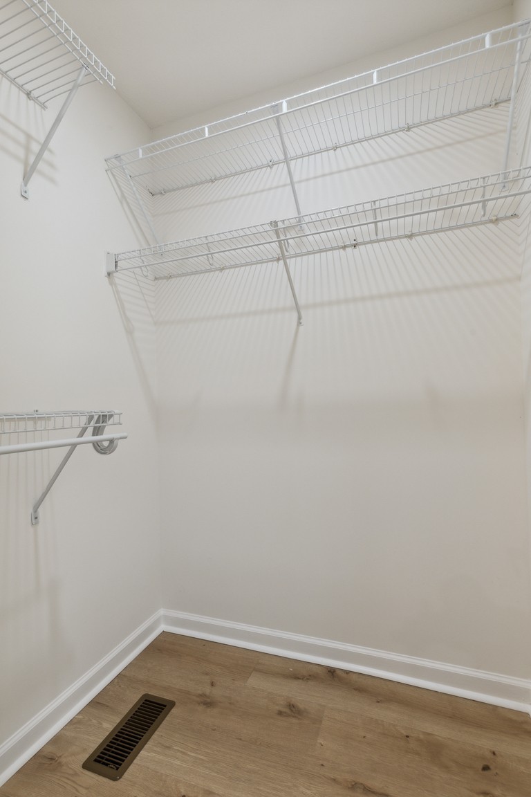 486 Berry Circle Springfield, TN 37172 - Photo 18 of 27 a view of a room with racks on the wall