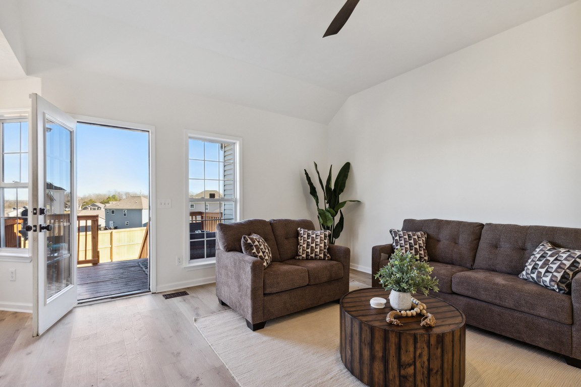 486 Berry Circle Springfield, TN 37172 - Photo 5 of 27 a living room with furniture and a couch