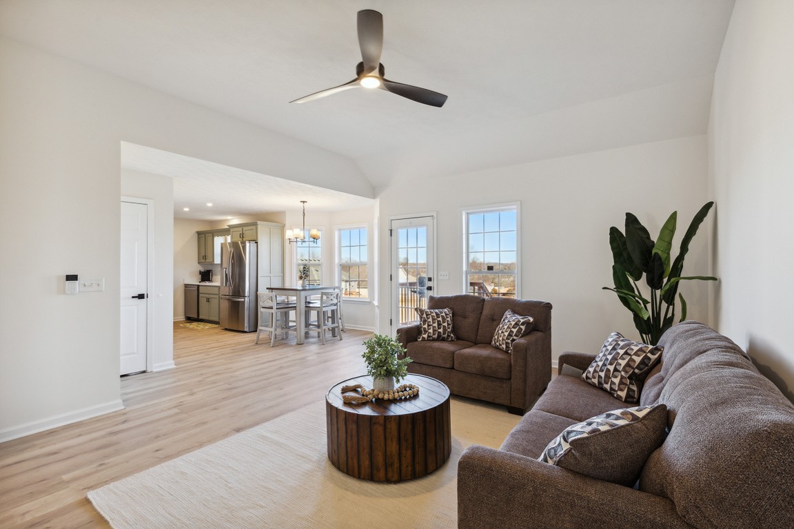 486 Berry Circle Springfield, TN 37172 - Photo 6 of 27 a living room with furniture and a potted plant