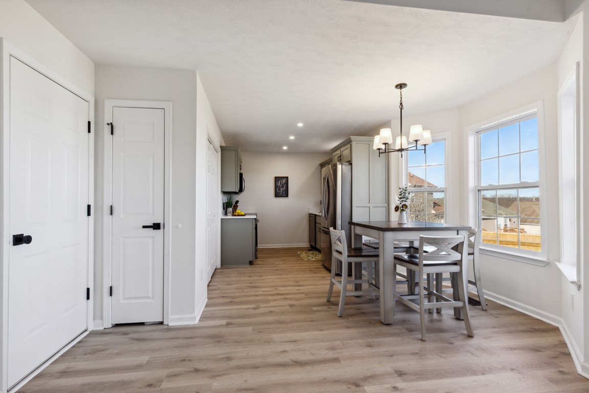 486 Berry Circle Springfield, TN 37172 - Photo 7 of 27 a view of a dining room with furniture and window