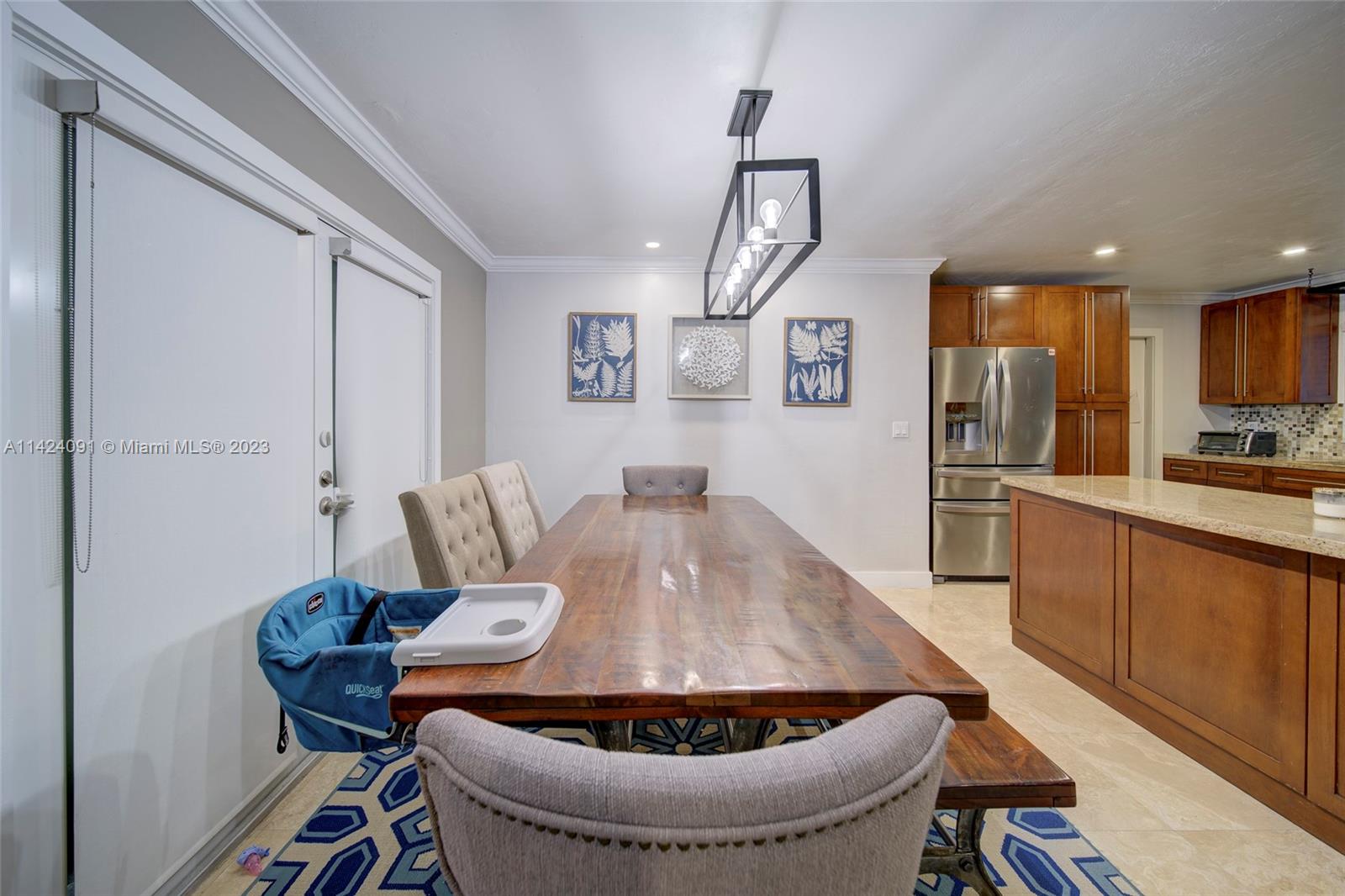 10600 Southwest 108th Terrace Miami, FL 33176 - Photo 13 of 43 a living room with furniture and a kitchen