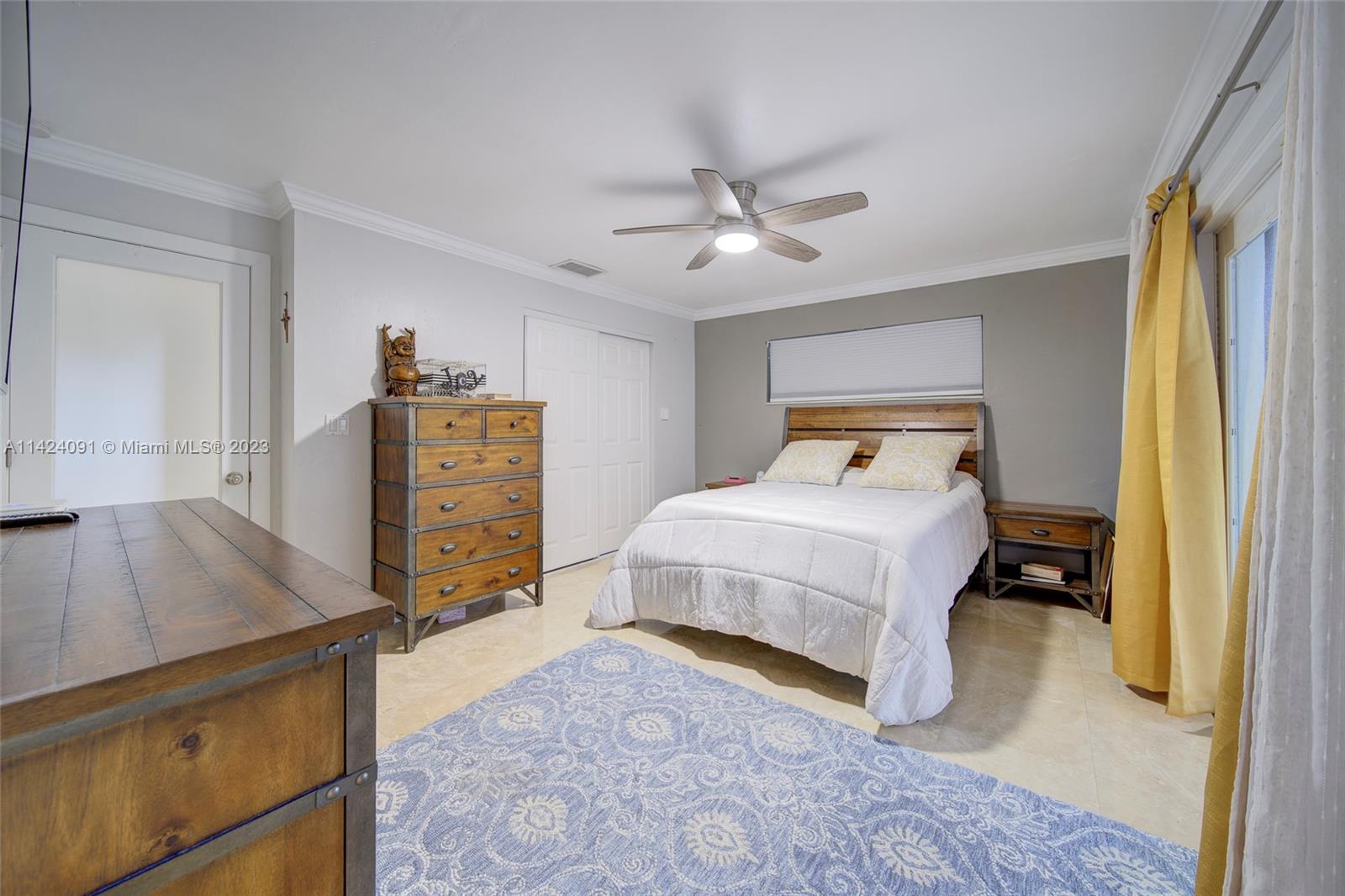 10600 Southwest 108th Terrace Miami, FL 33176 - Photo 20 of 43 a bedroom with a bed and a dresser