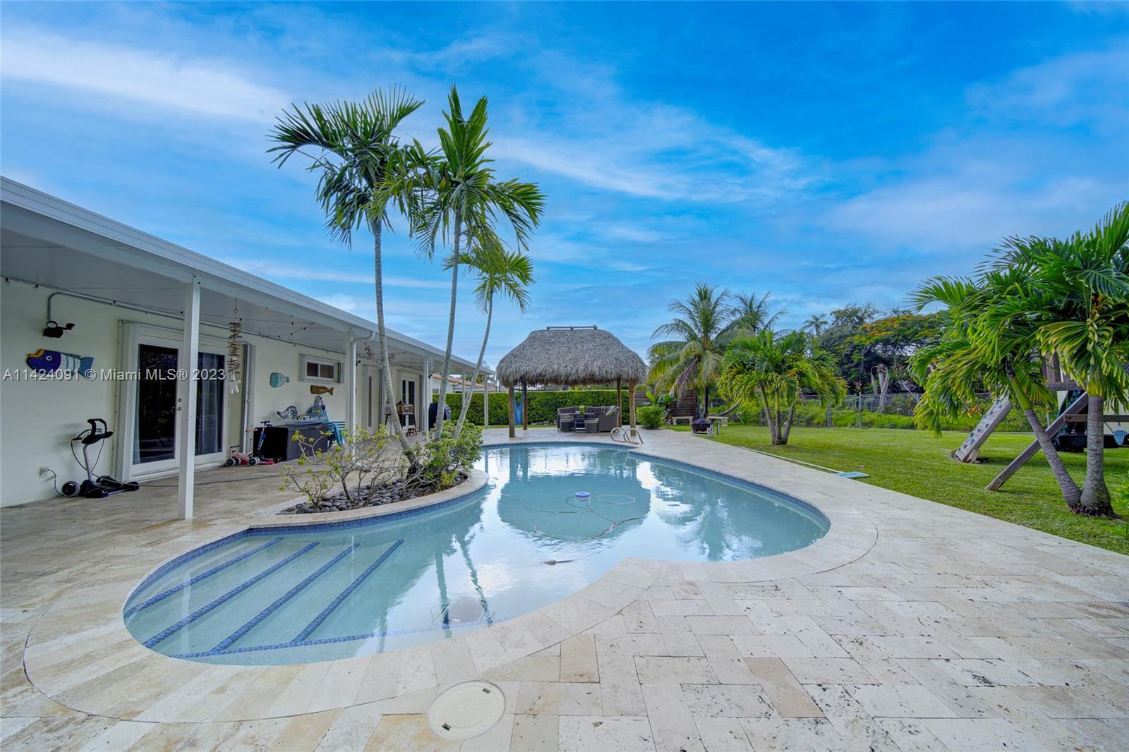 10600 Southwest 108th Terrace Miami, FL 33176 - Photo 31 of 43 a view of outdoor space yard deck patio and swimming pool