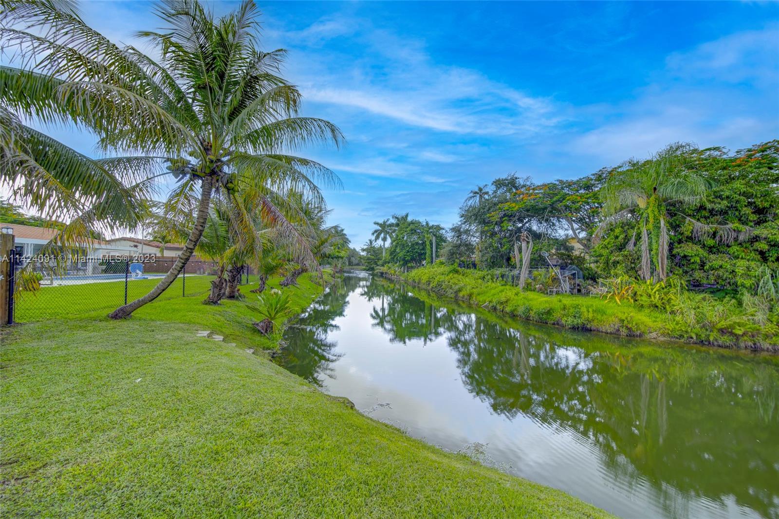 10600 Southwest 108th Terrace Miami, FL 33176 - Photo 40 of 43 a view of a lake with a big yard