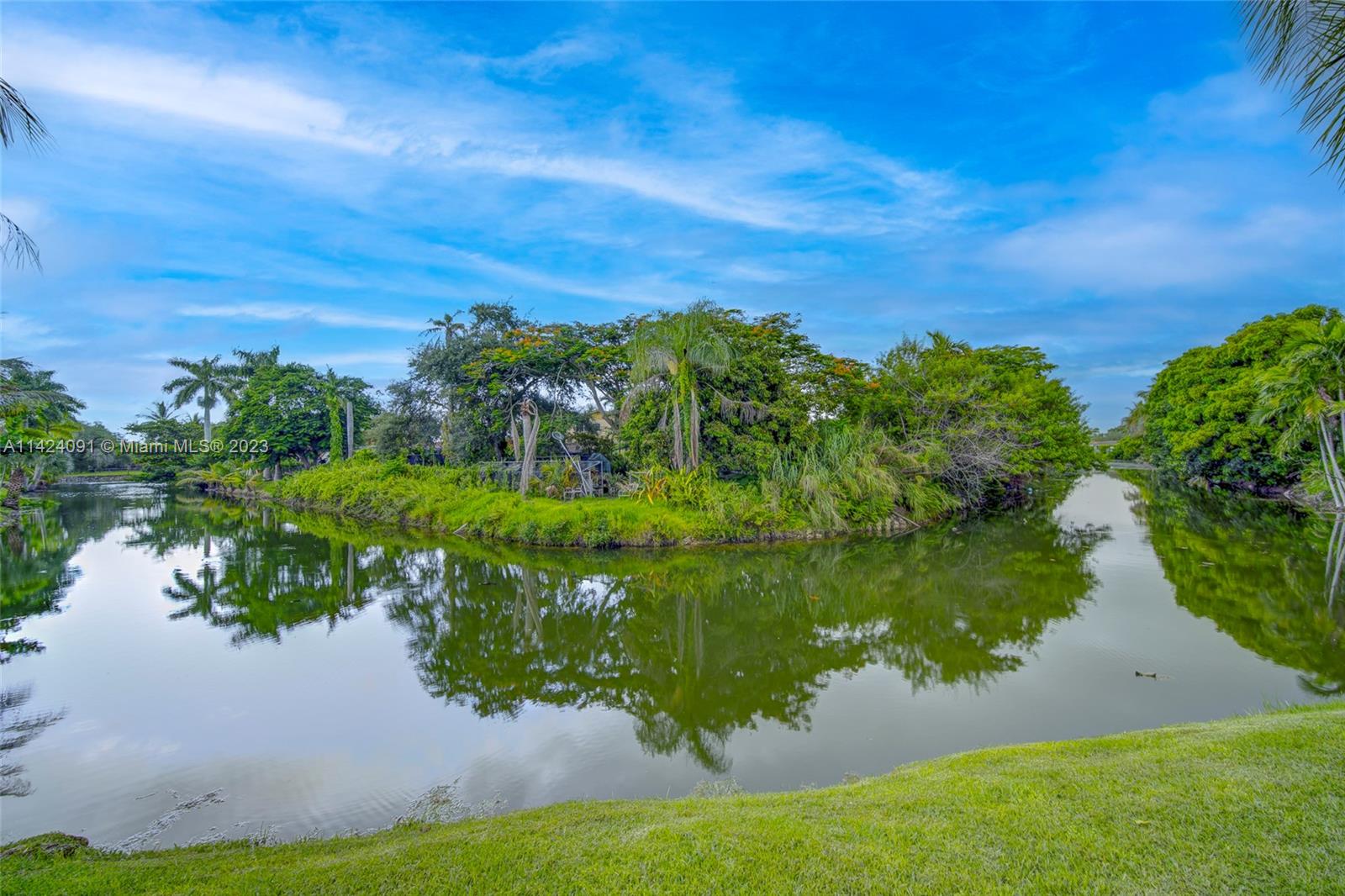 10600 Southwest 108th Terrace Miami, FL 33176 - Photo 41 of 43 a view of a lake from a yard