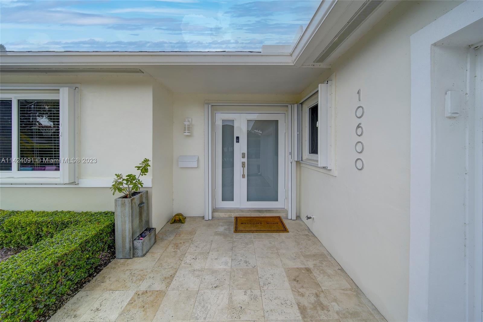 10600 Southwest 108th Terrace Miami, FL 33176 - Photo 5 of 43 a view of a entrance door of the house