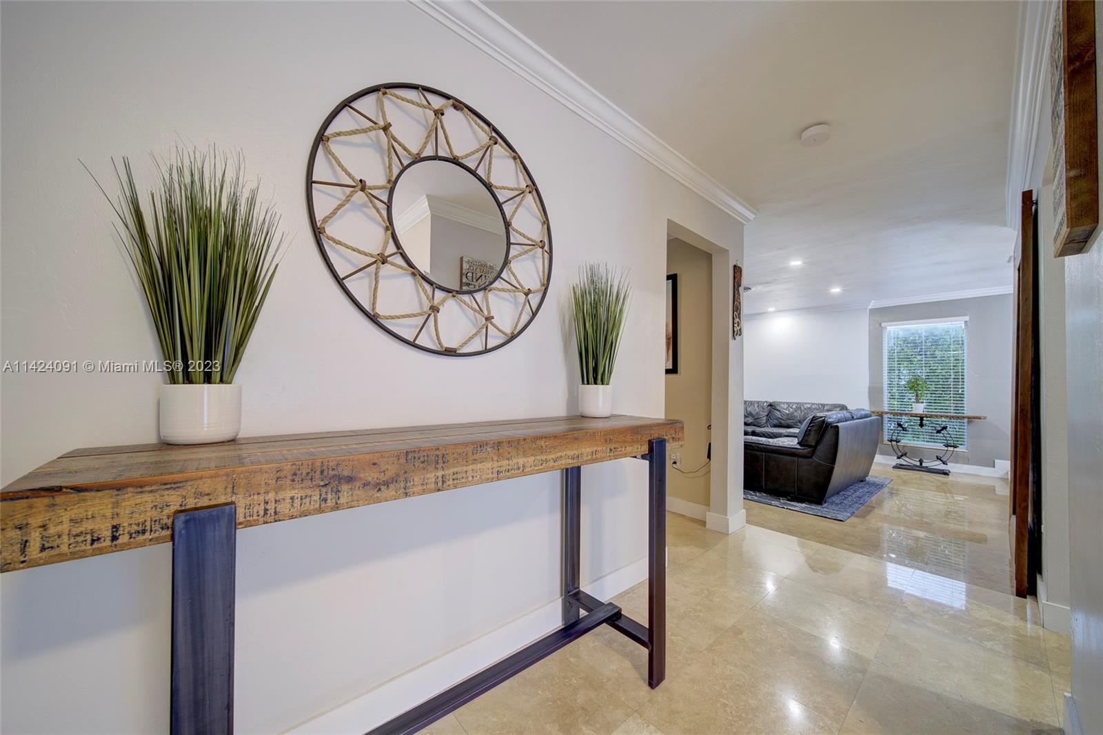 10600 Southwest 108th Terrace Miami, FL 33176 - Photo 7 of 43 a view of living room with furniture and a potted plant