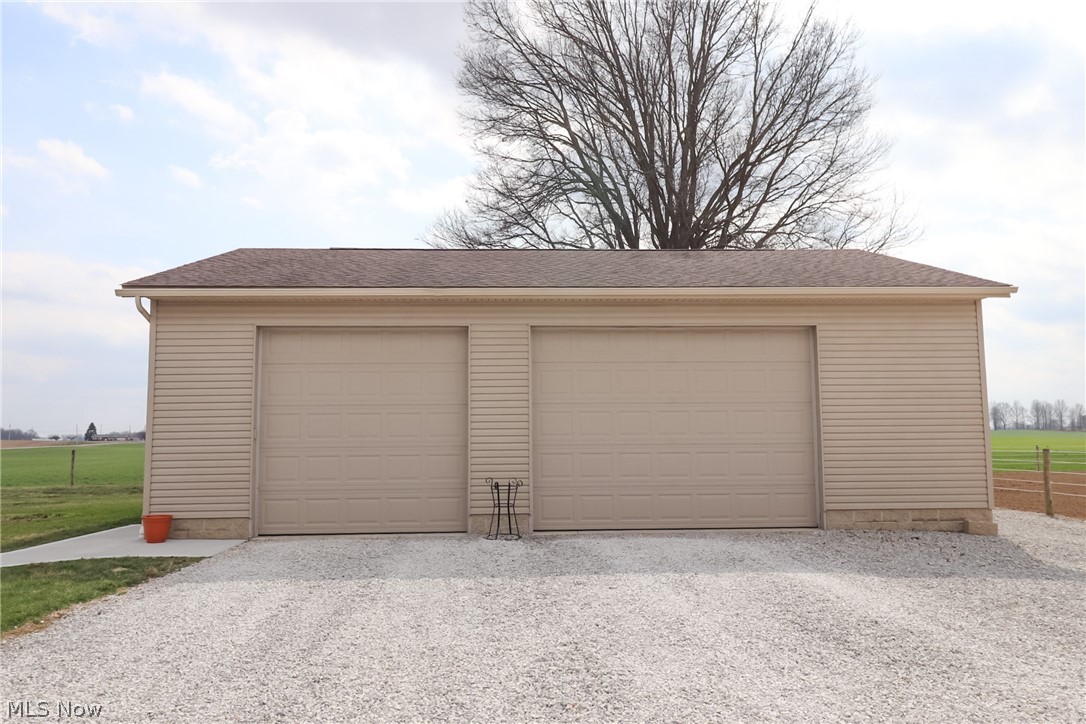 1153 East Pleasant Home Road Wooster, OH 44691 - Photo 5 of 48 Heated garage/shop is 32'x40' with 12'ceiling.