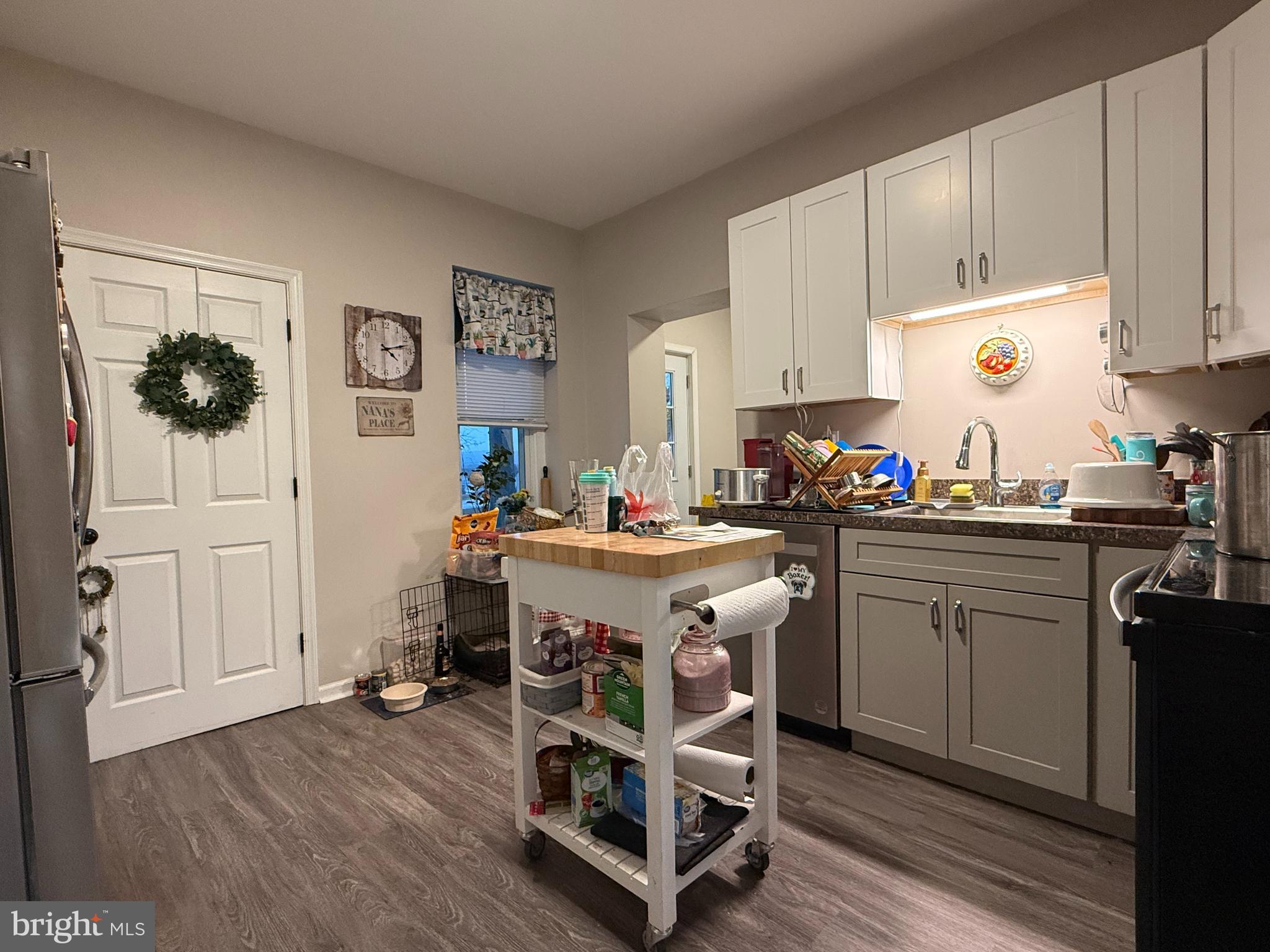 438 Main Street Red Hill, PA 18076 - Photo 11 of 29 a kitchen with a sink cabinets and wooden floor