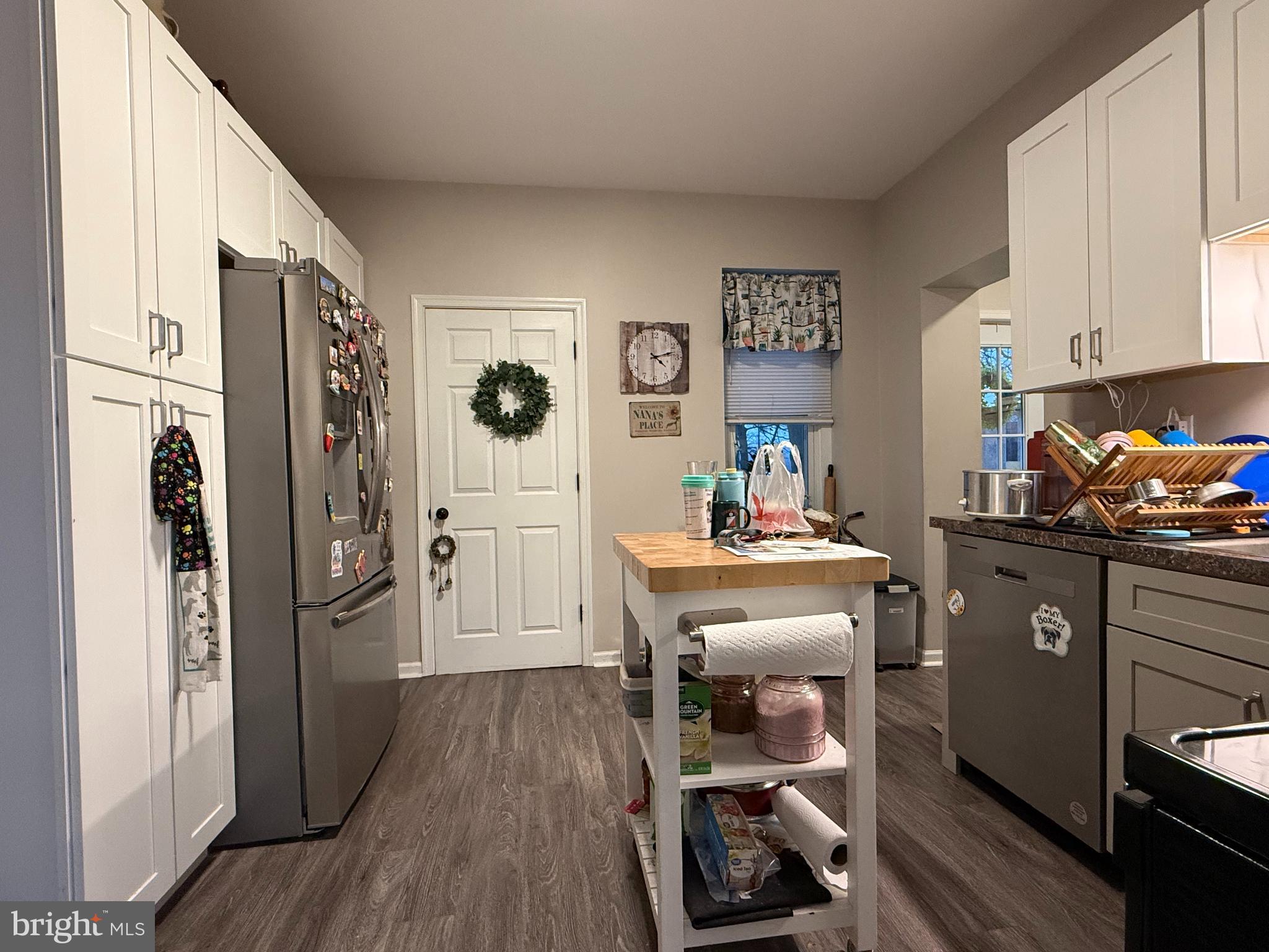438 Main Street Red Hill, PA 18076 - Photo 13 of 29 a kitchen with a refrigerator and cabinets