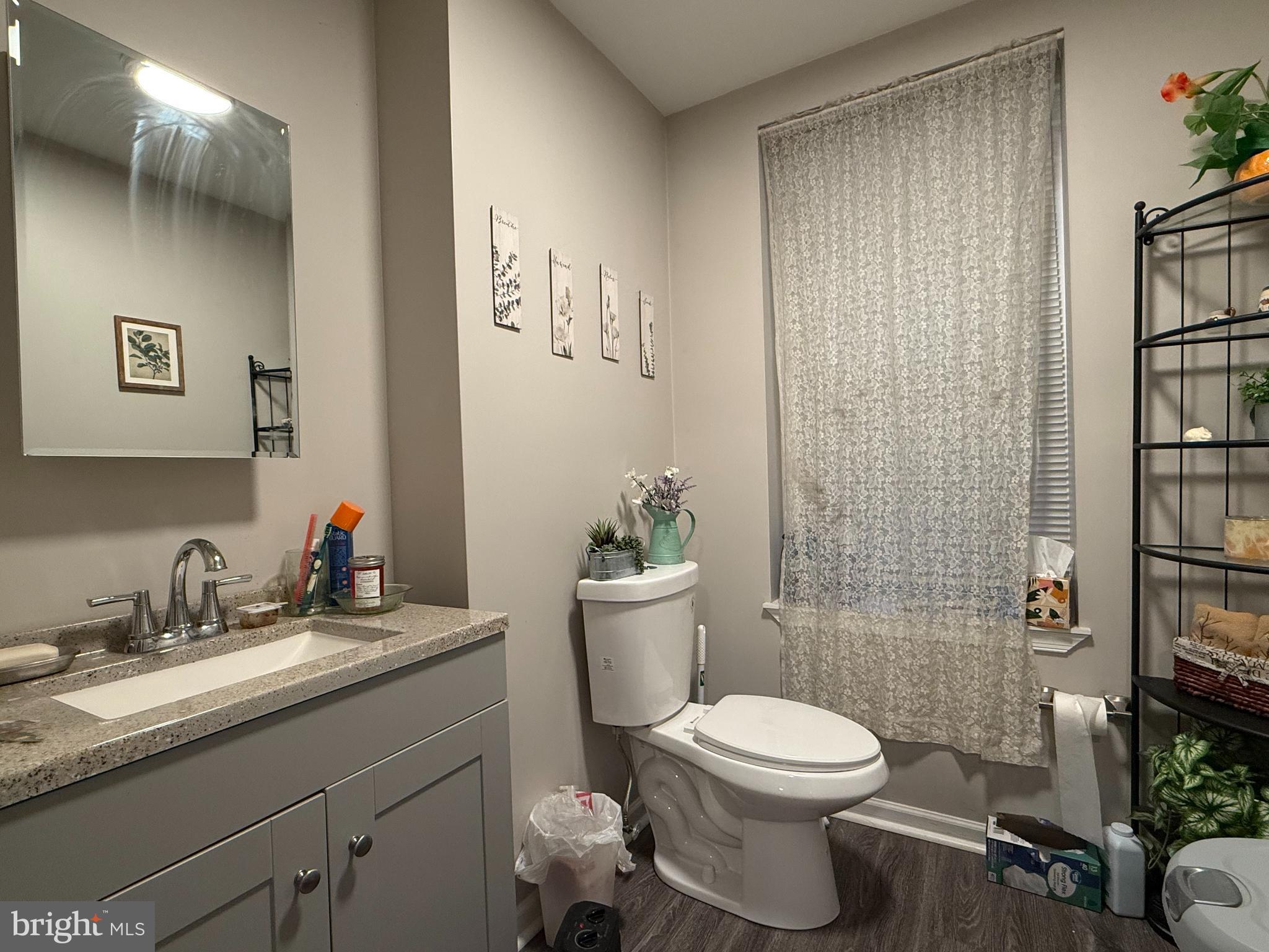 438 Main Street Red Hill, PA 18076 - Photo 16 of 29 a bathroom with a toilet a sink and shower