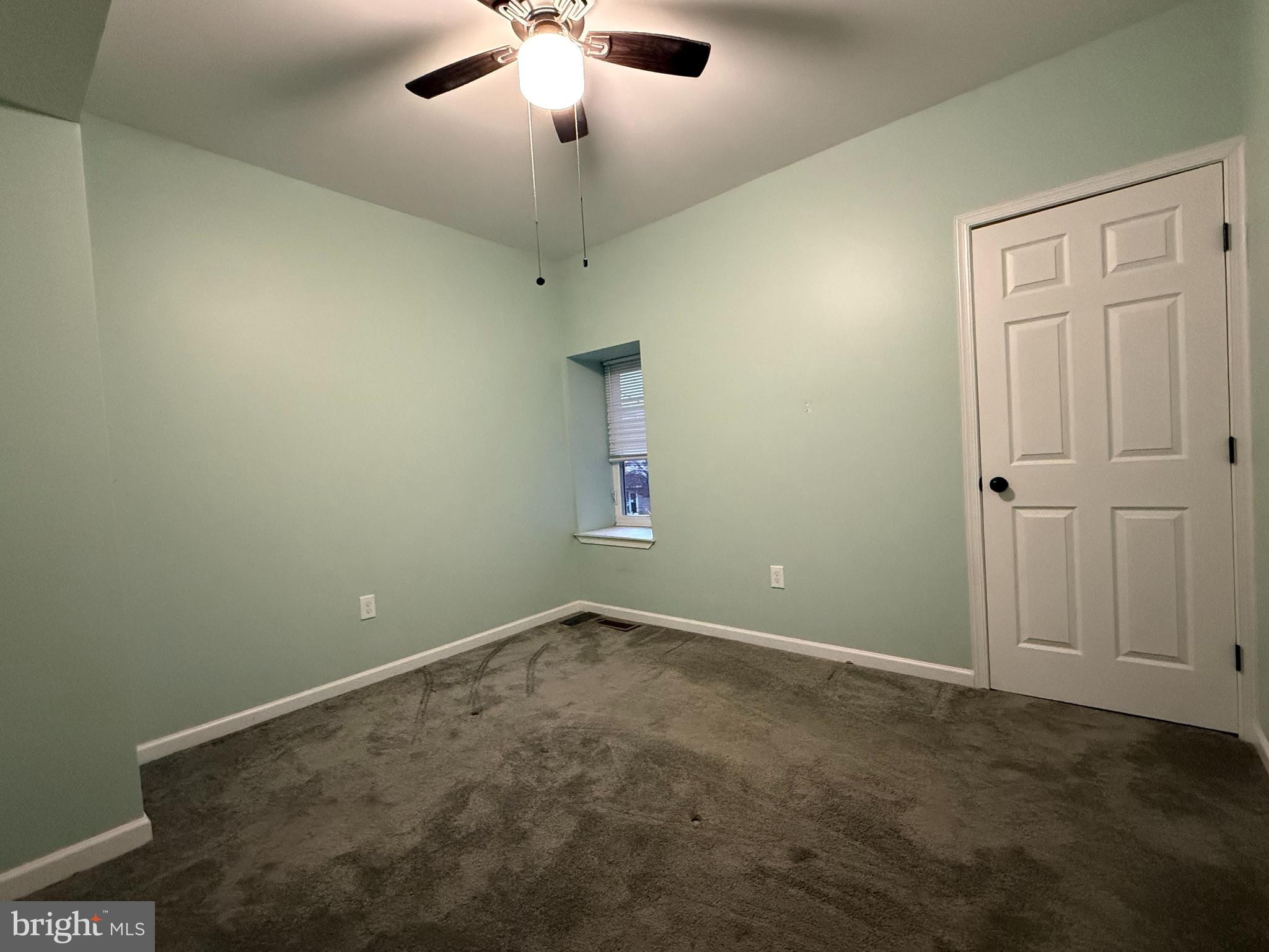 438 Main Street Red Hill, PA 18076 - Photo 19 of 29 an empty room with a ceiling fan