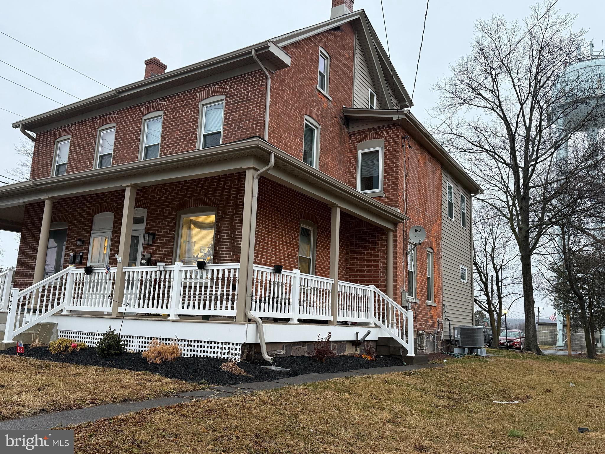 438 Main Street Red Hill, PA 18076 - Photo 2 of 29 a front view of a house with a yard